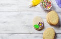 Cookies with decorations tools Ã¢â¬â icing, marzipan flower, nonpareil Royalty Free Stock Photo